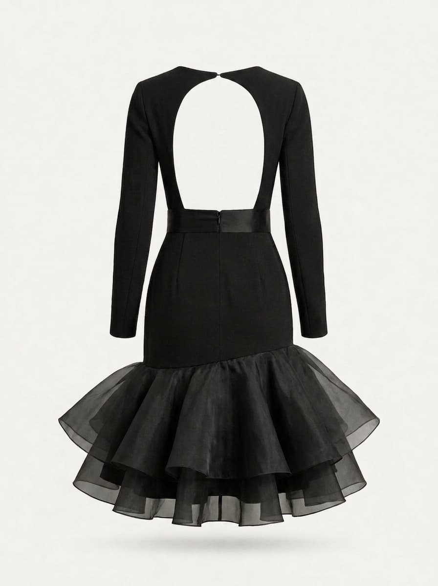Back view of the black dress with a large open circle cut-out